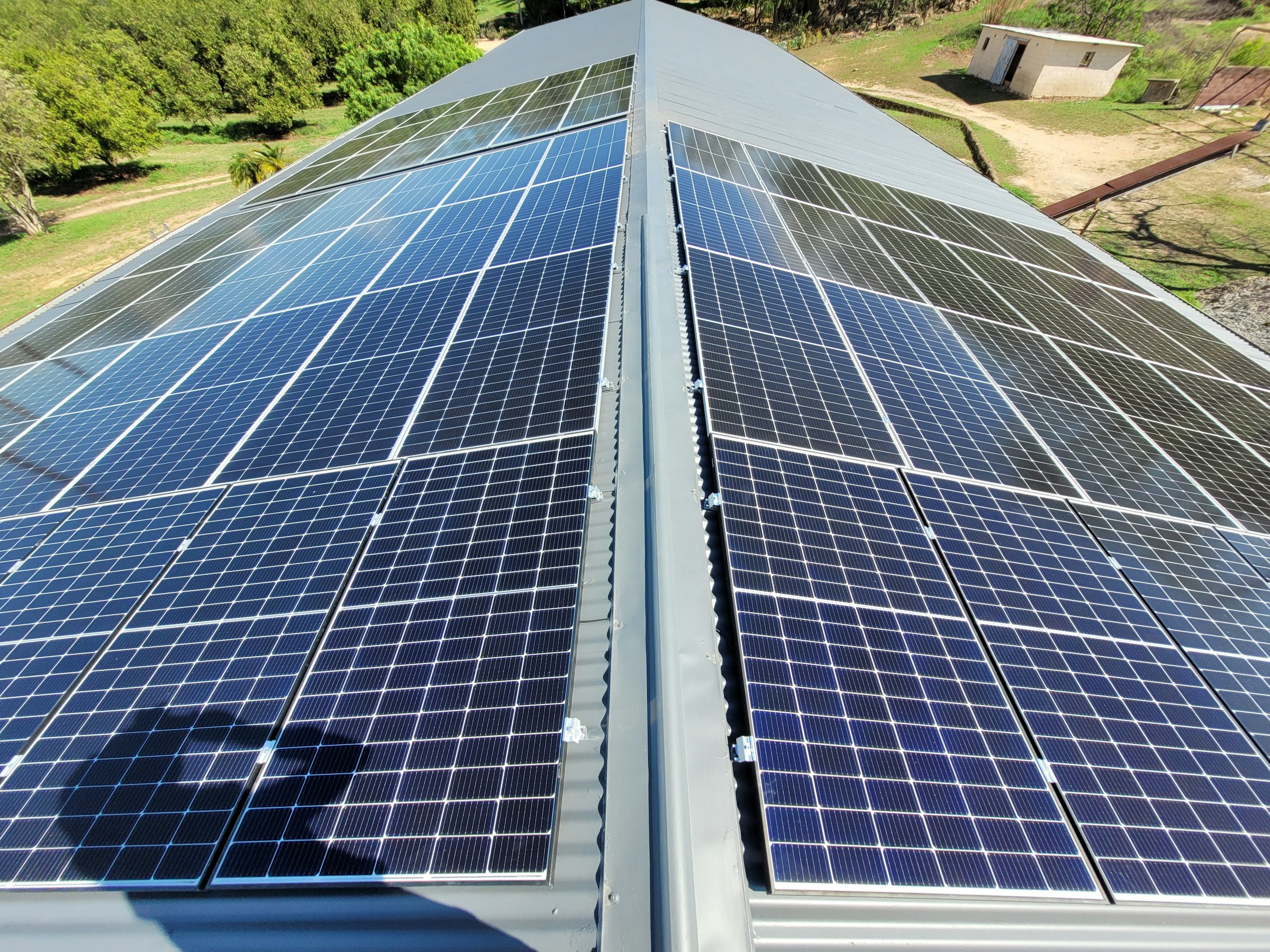 Solar modules mounted in rows on a roof