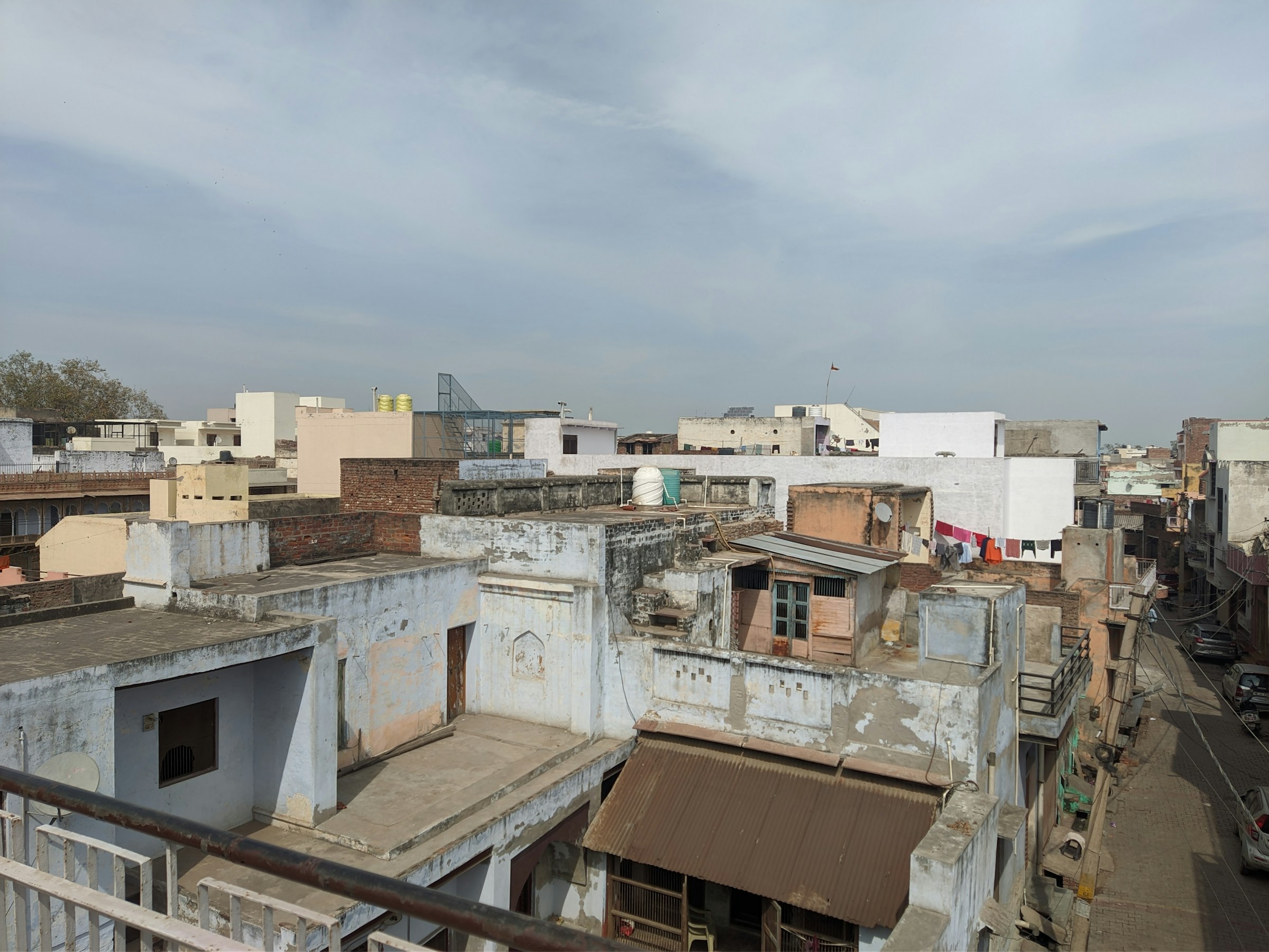 Dense Indian rooftops with water tanks
