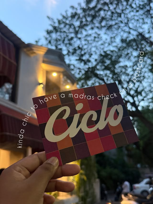 A Ciclo postcard outside the café